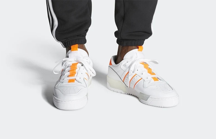 adidas Rivalry Low Solar Orange EE4965 on foot 01