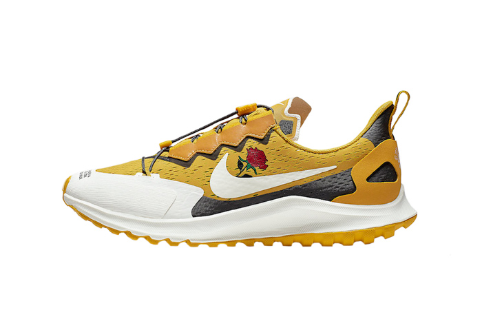 yellow nike with rose