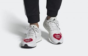 Human Made adidas Solar Hu Red White EG1837 on foot 01