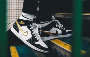 Nike Jordan 1 Mid Patent Black White Gold 852542-007 on foot 01
