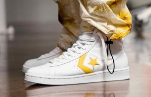 Converse Pro Leather Mid Yellow White 166812C on foot 01
