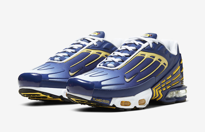 navy blue and white air max plus
