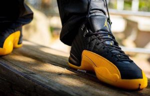 Jordan 12 Retro Black Yellow Toe 130690-070 lifestyle on foot