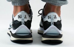 Sacai Nike Vaporwaffle Black White CV1363-001 on foot 03