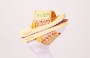 KidSuper PUMA Wilo Slide Yellow Peach 373543-01 on foot 01
