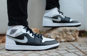 Nike Jordan 1 Mid Black Smoke Grey 554724-073 on foot 01