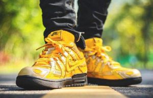Off-White Nike Rubber Dunk University Gold CU6015-700 on foot 02