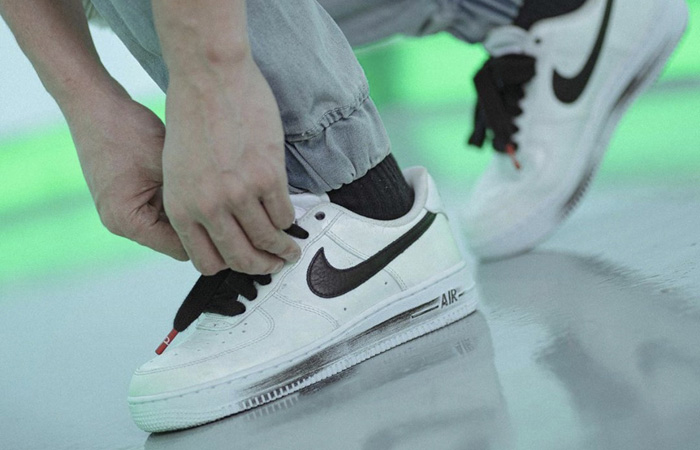 PEACEMINUSONE Nike Air Force 1 Paranoise White DD3223-100 on foot 02