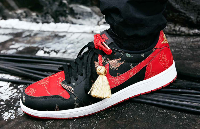 Air Jordan 1 Low Chinese New Year Bred Gold DD2233-001 on foot 01