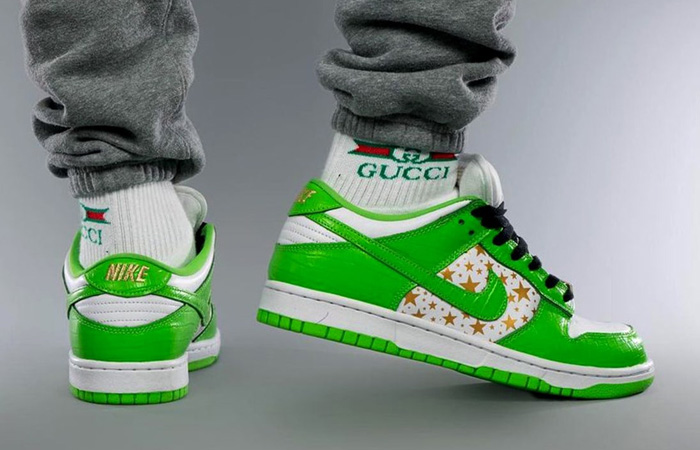 Supreme Nike Dunk Low Stars Mean Green White DH3228-101 on foot 03