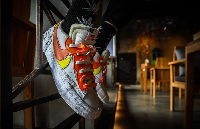 sacai Nike Blazer Low White Magma Orange DD1877-100 on foot 02