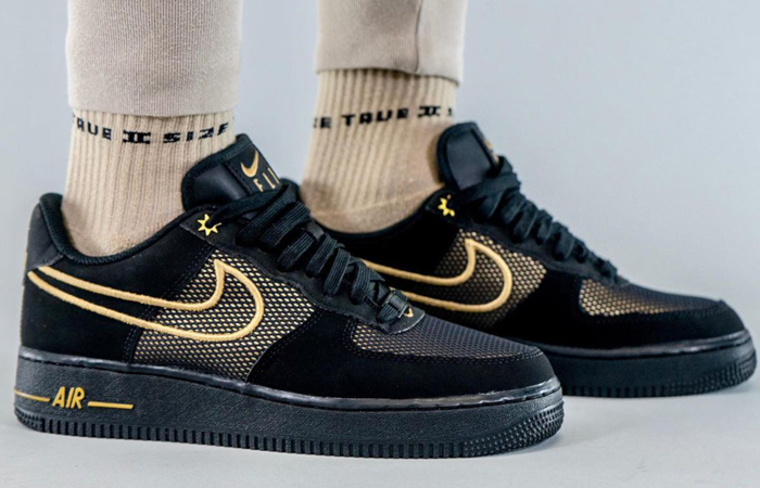 Nike Air Force 1 Low Legendary Black Gold DM8077-001 on foot 01