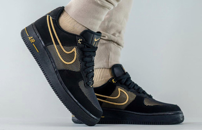 Nike Air Force 1 Low Legendary Black Gold DM8077-001 on foot 04