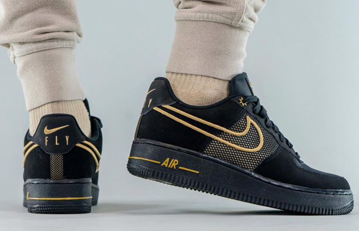 Nike Air Force 1 Low Legendary Black Gold DM8077-001 on foot