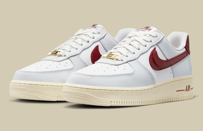 Nike Air Force 1 Low Gold Hangtag White Red DV7584-001 front corner